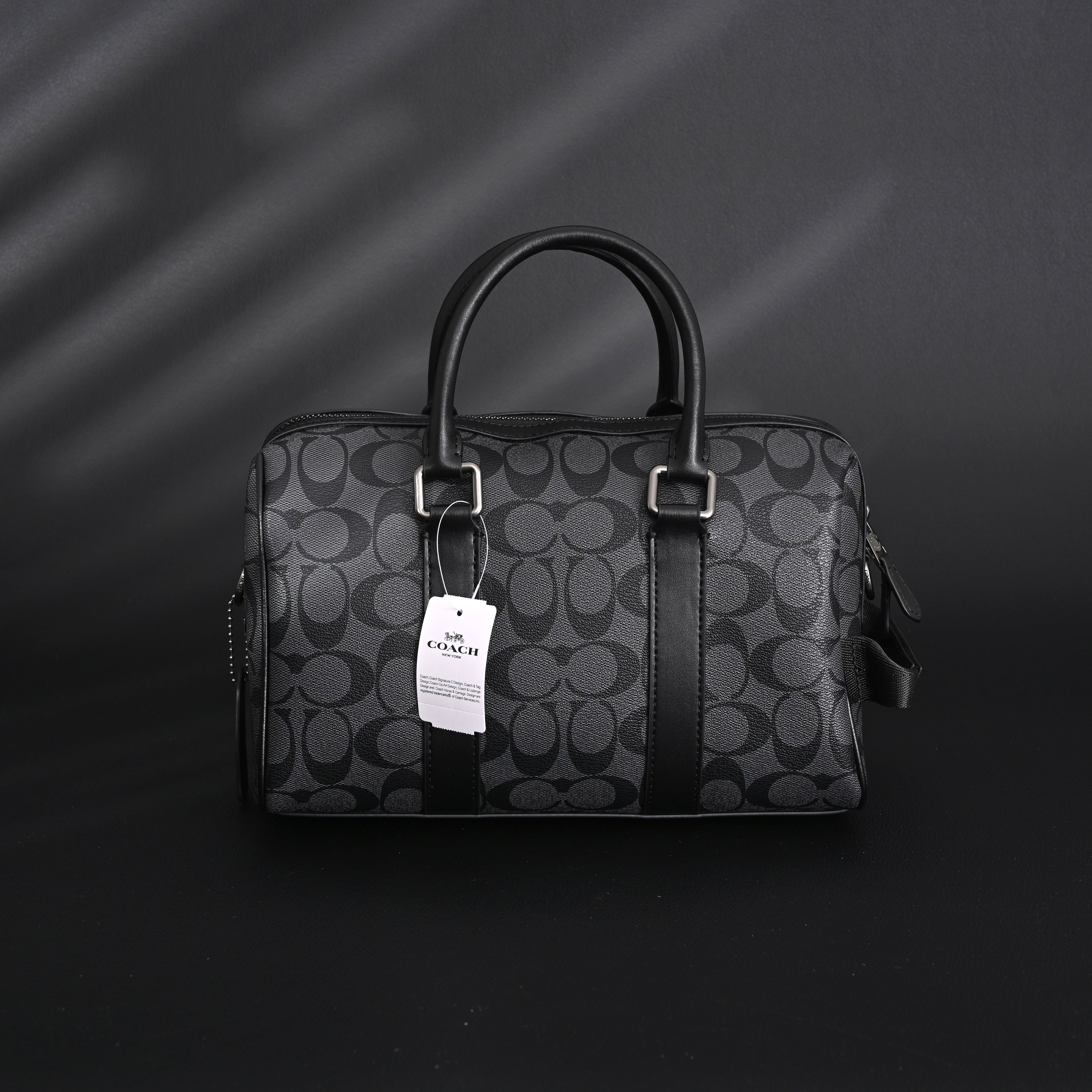 Coach Signature Duffel Bag – Black Monogram Canvas with Leather Trim